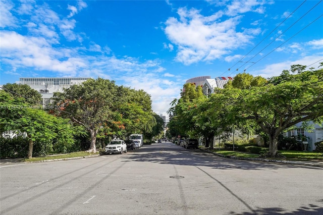 view of street with sidewalks and curbs