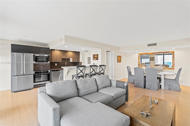 living room featuring light hardwood / wood-style floors