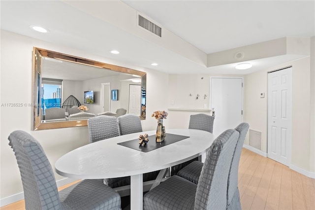 dining space featuring light hardwood / wood-style floors