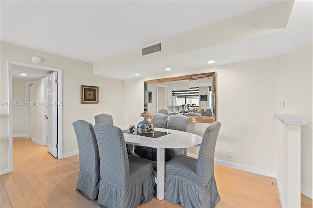 dining room featuring light hardwood / wood-style floors