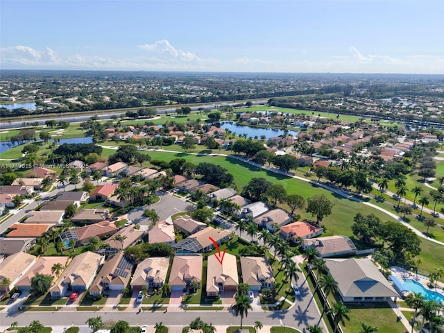 drone / aerial view with a water view