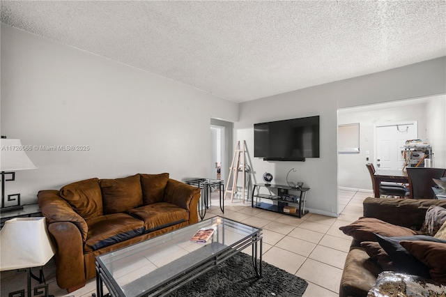 tiled living room with a textured ceiling