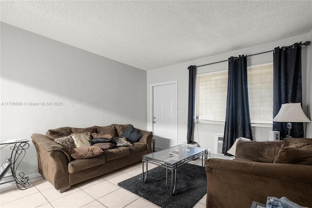 tiled living room with a textured ceiling