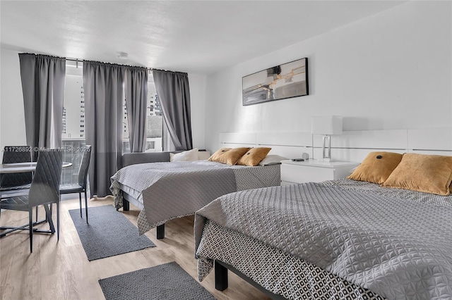 bedroom featuring light hardwood / wood-style floors