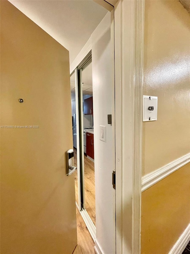 hall featuring hardwood / wood-style flooring