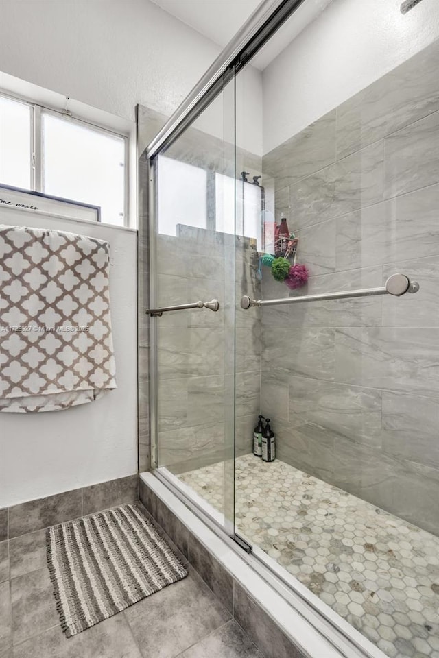 bathroom featuring an enclosed shower