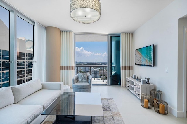 living room with expansive windows and a healthy amount of sunlight