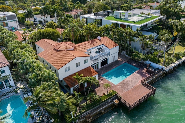 birds eye view of property featuring a water view