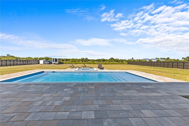 view of pool featuring a yard