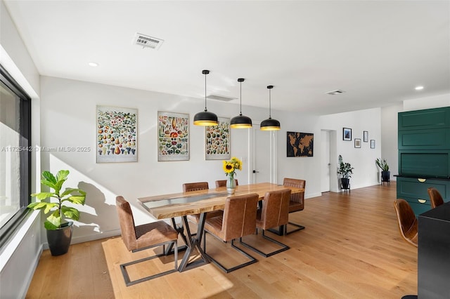 dining room featuring light hardwood / wood-style flooring