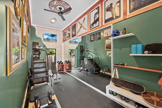 workout area with ceiling fan