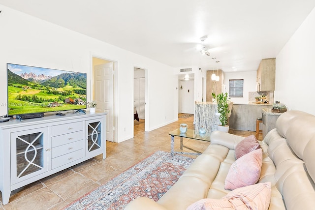 living room with ceiling fan