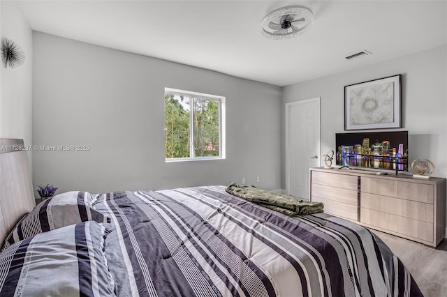 bedroom featuring light hardwood / wood-style floors