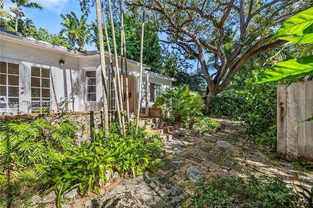 view of yard featuring french doors