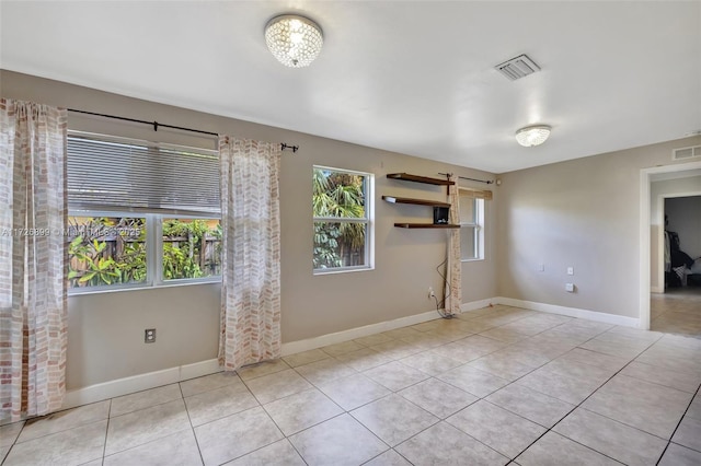 view of tiled spare room