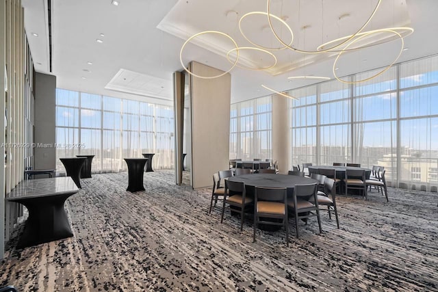 dining space featuring floor to ceiling windows