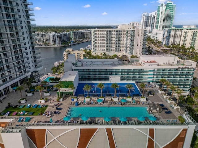 birds eye view of property with a water view