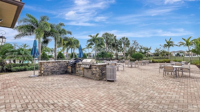 view of patio / terrace with an outdoor kitchen and grilling area