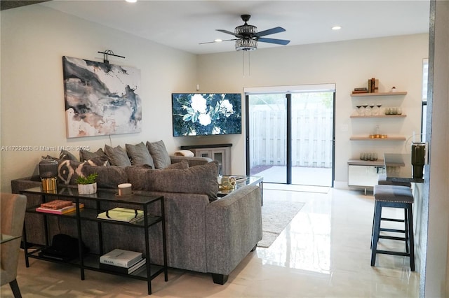 living room with ceiling fan