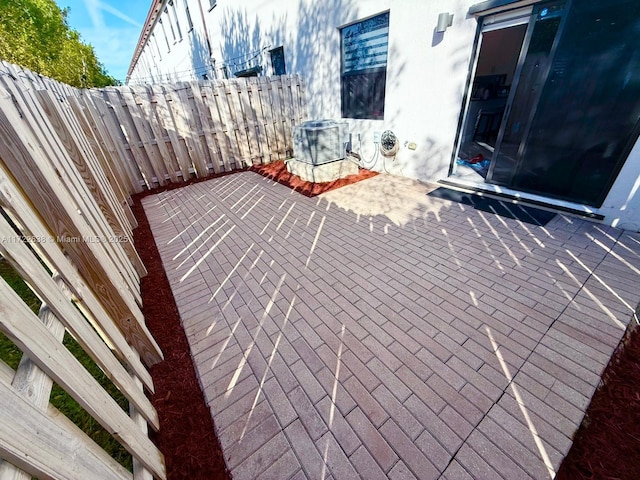 view of patio with cooling unit