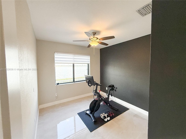 exercise room featuring ceiling fan