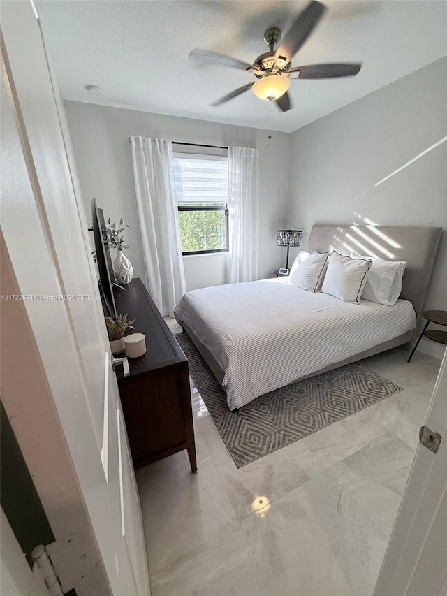 bedroom featuring ceiling fan