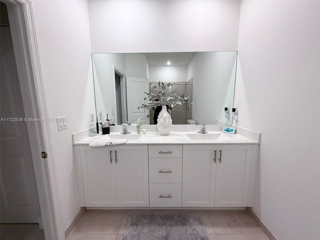 bathroom featuring vanity and tile patterned floors