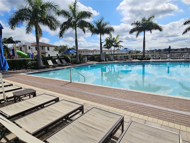 view of swimming pool featuring a patio area