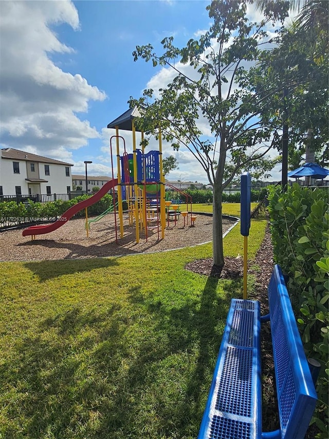 view of play area with a yard