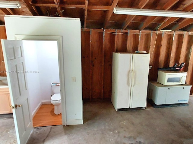 interior space with white fridge