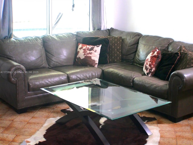 living room featuring tile patterned flooring