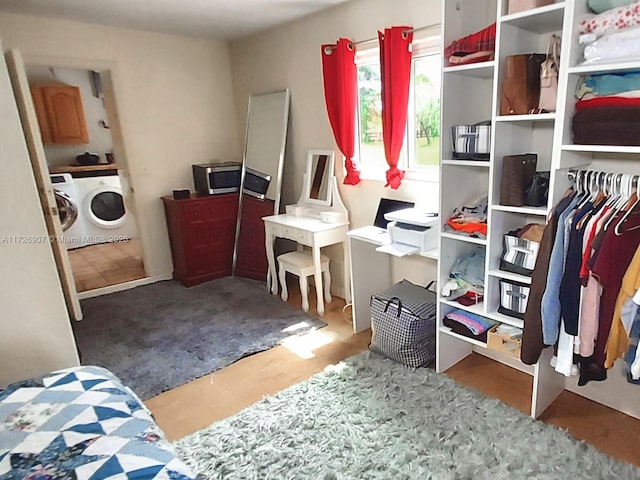 interior space with washer and clothes dryer