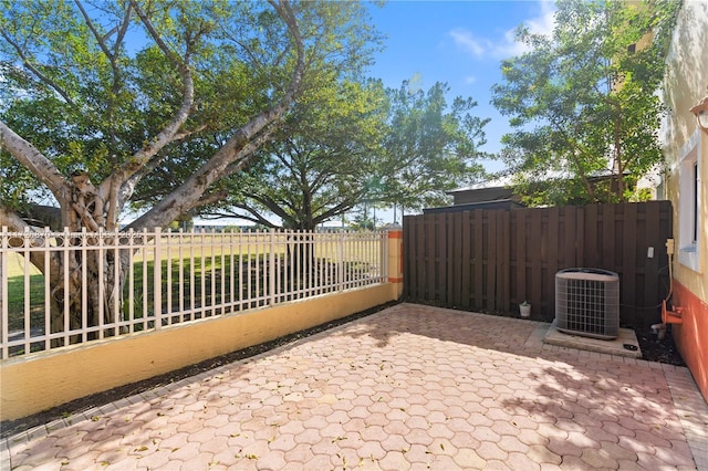 view of patio with cooling unit