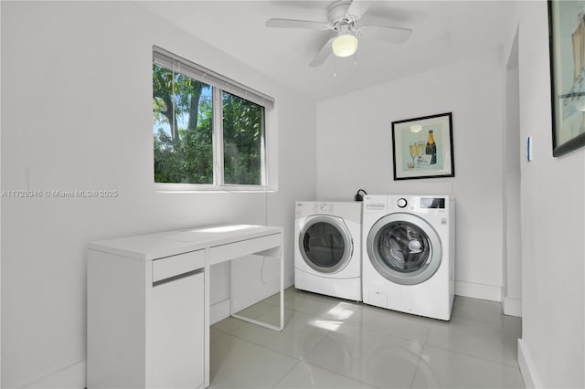 laundry area featuring ceiling fan, independent washer and dryer, and light tile patterned flooring