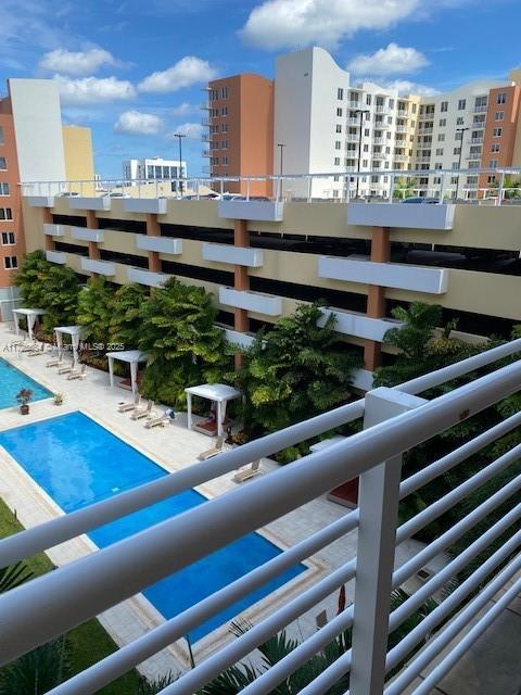 view of pool featuring a patio area