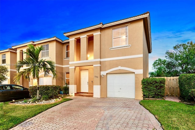 view of front of property featuring a garage