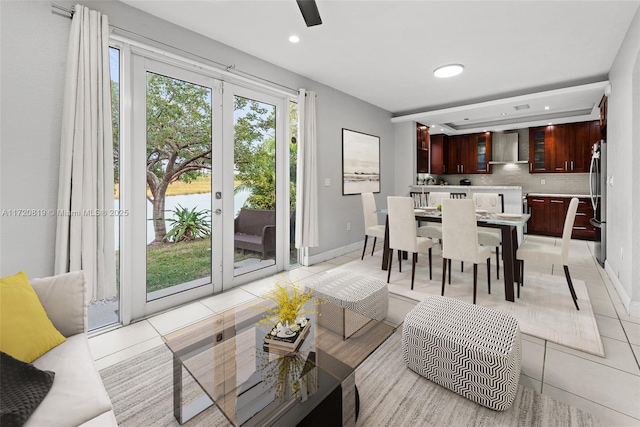 dining area with light tile patterned floors