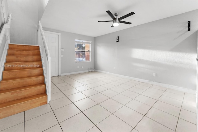 interior space featuring ceiling fan and light tile patterned floors