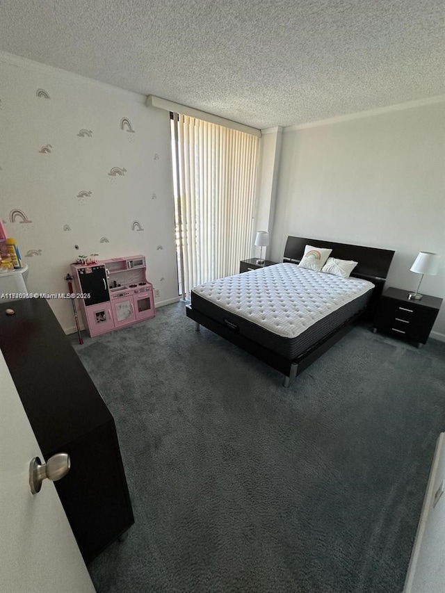 carpeted bedroom featuring a textured ceiling