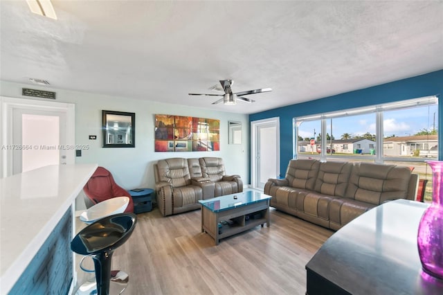 1916 SW 47th Ave, Fort Lauderdale, FL 33317 - living area featuring visible vents, a ceiling fan, and light wood-style floors