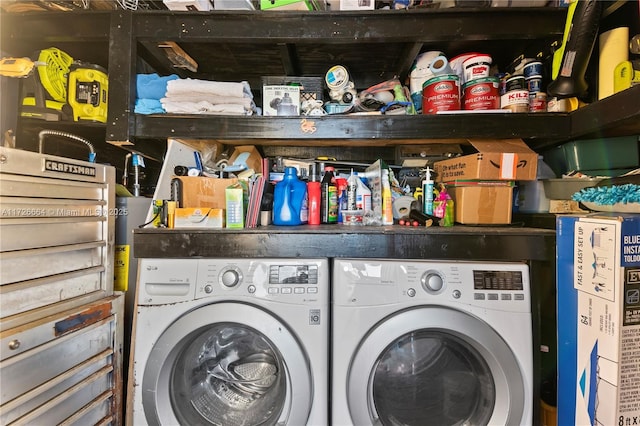 clothes washing area featuring washer and dryer