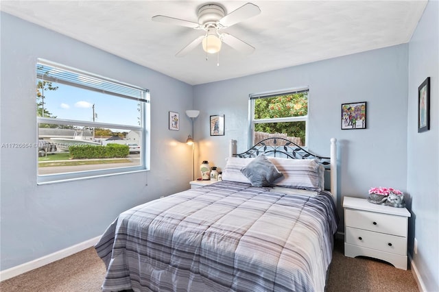 1916 SW 47th Ave, Fort Lauderdale, FL 33317 - carpeted bedroom with baseboards and a ceiling fan