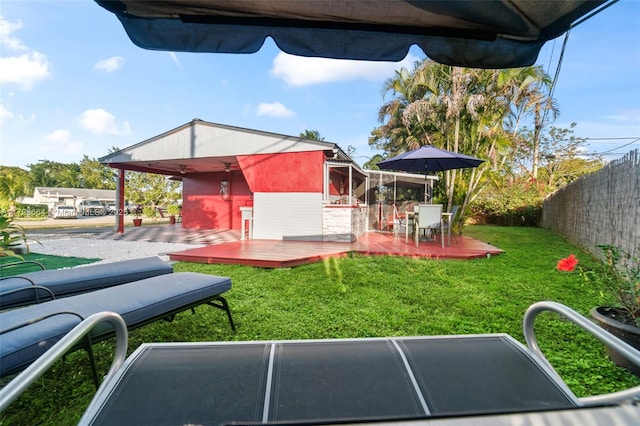 1916 SW 47th Ave, Fort Lauderdale, FL 33317 - view of yard featuring a wooden deck, a fenced backyard, and a ceiling fan