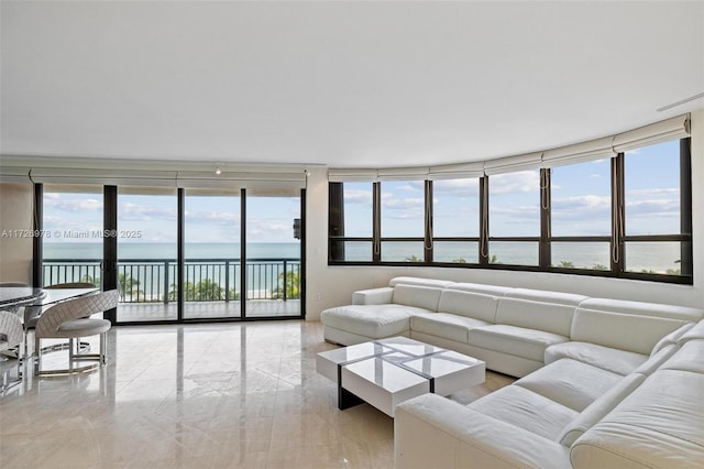 living room featuring a water view