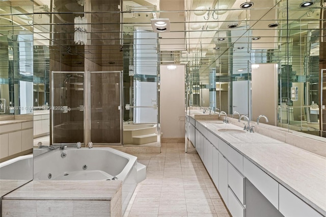 bathroom featuring tile patterned floors, vanity, and independent shower and bath