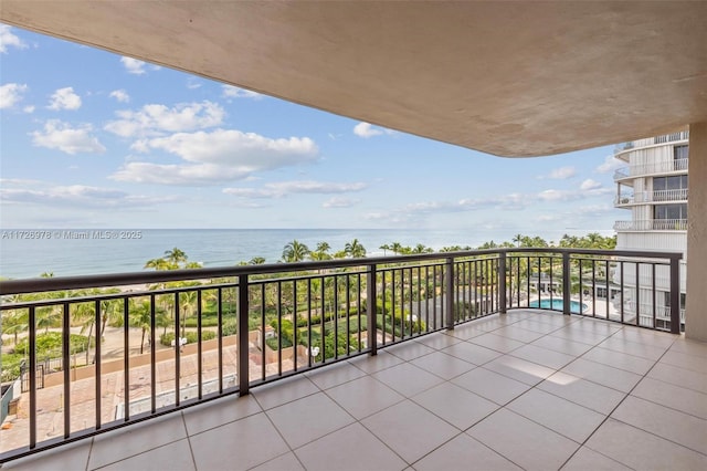 balcony featuring a water view