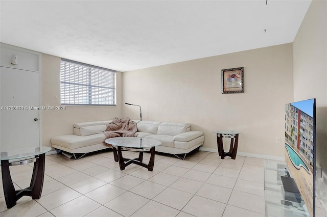 living room with light tile patterned floors