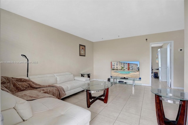 living room with light tile patterned floors