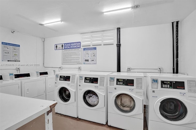 laundry area featuring separate washer and dryer