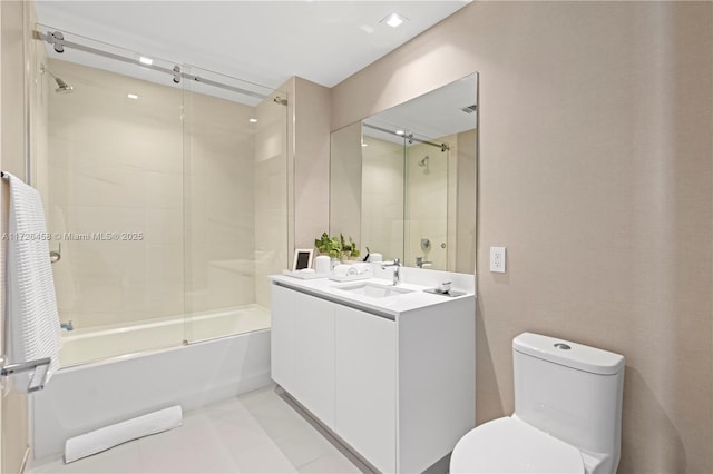 full bath with toilet, shower / bath combination with glass door, and vanity